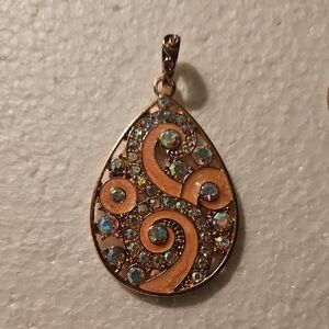 Gold-Tone Teardrop Pendant with Iridescent Crystals